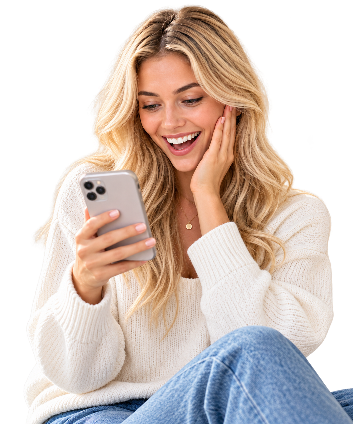 A smiling woman looking at her phone